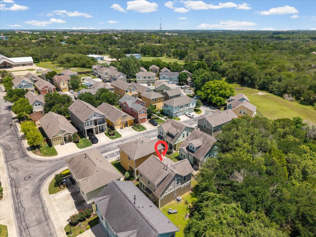 12200 Tawny Farms Road, Unit 139 Austin, TX 78748 - Photo 28 of 30 Look at how the entire right side of the neighborhood opens up into that massive expanse of green space. You truly get the best of both worlds here: a vibrant, neighborly community vibe with vast nature right at your doorstep.