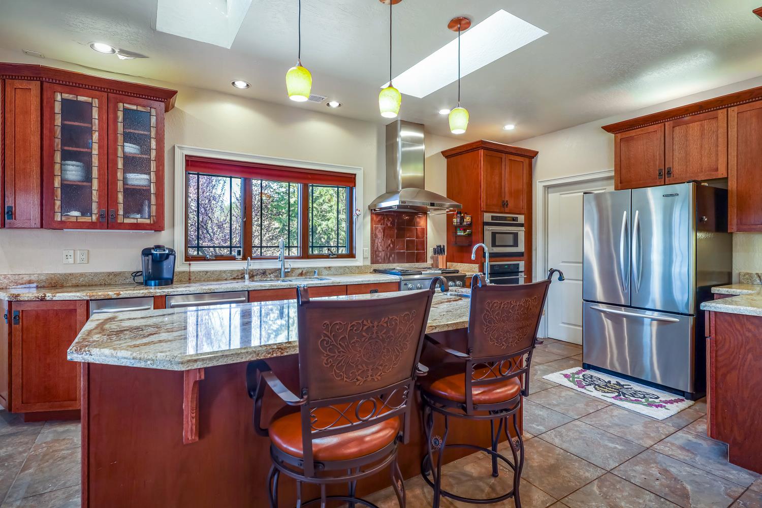 5603 Gold Mountain Road Mountain Ranch, CA 95246 - Photo 12 of 75 GOURMET KITCHEN WITH TOP OF THE LINE APPLIANCES, CUSTOM CABNITRY, SKYLIGHTS, AND WALK IN PANTRY