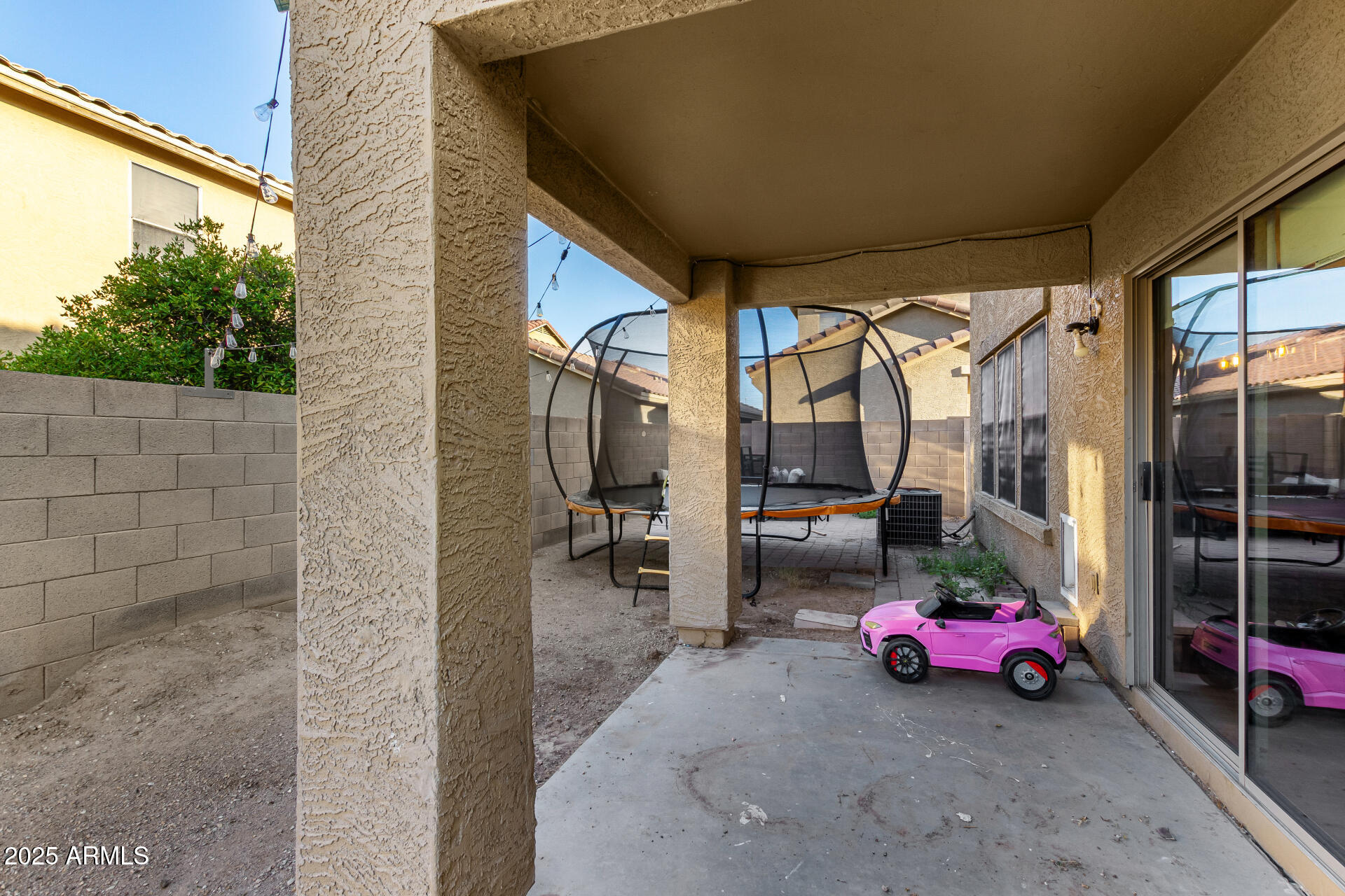 9415 West Eaton Road Phoenix, AZ 85037 - Photo 35 of 36 a view of car parked in front of building