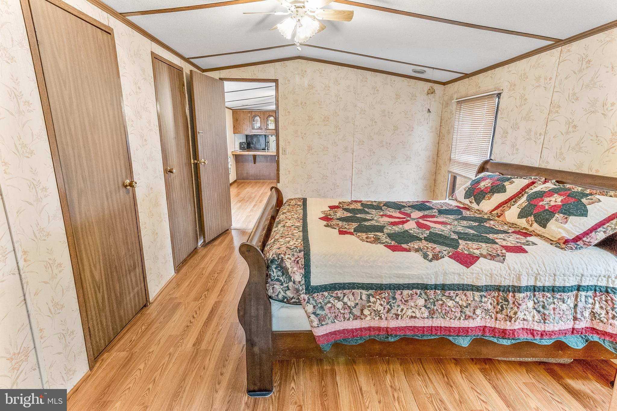 87 Explorer Lane Martinsburg, WV 25404 - Photo 16 of 27 a bedroom with a bed and a table