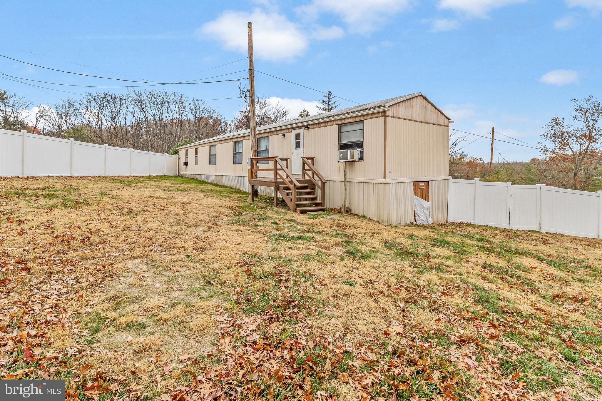 87 Explorer Lane Martinsburg, WV 25404 - Photo 24 of 27 a view of a backyard