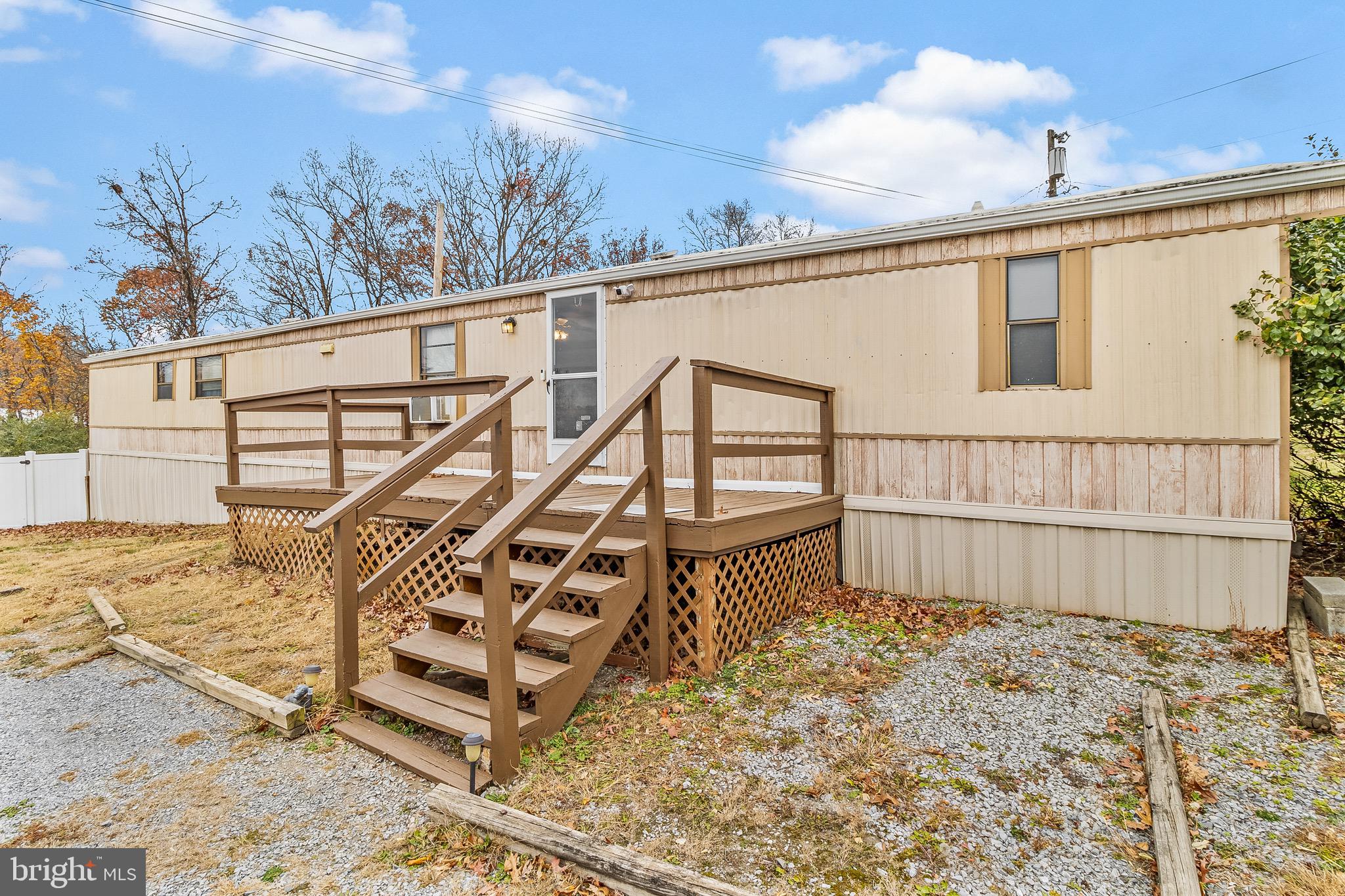 87 Explorer Lane Martinsburg, WV 25404 - Photo 5 of 27 a view of a house with wooden fence