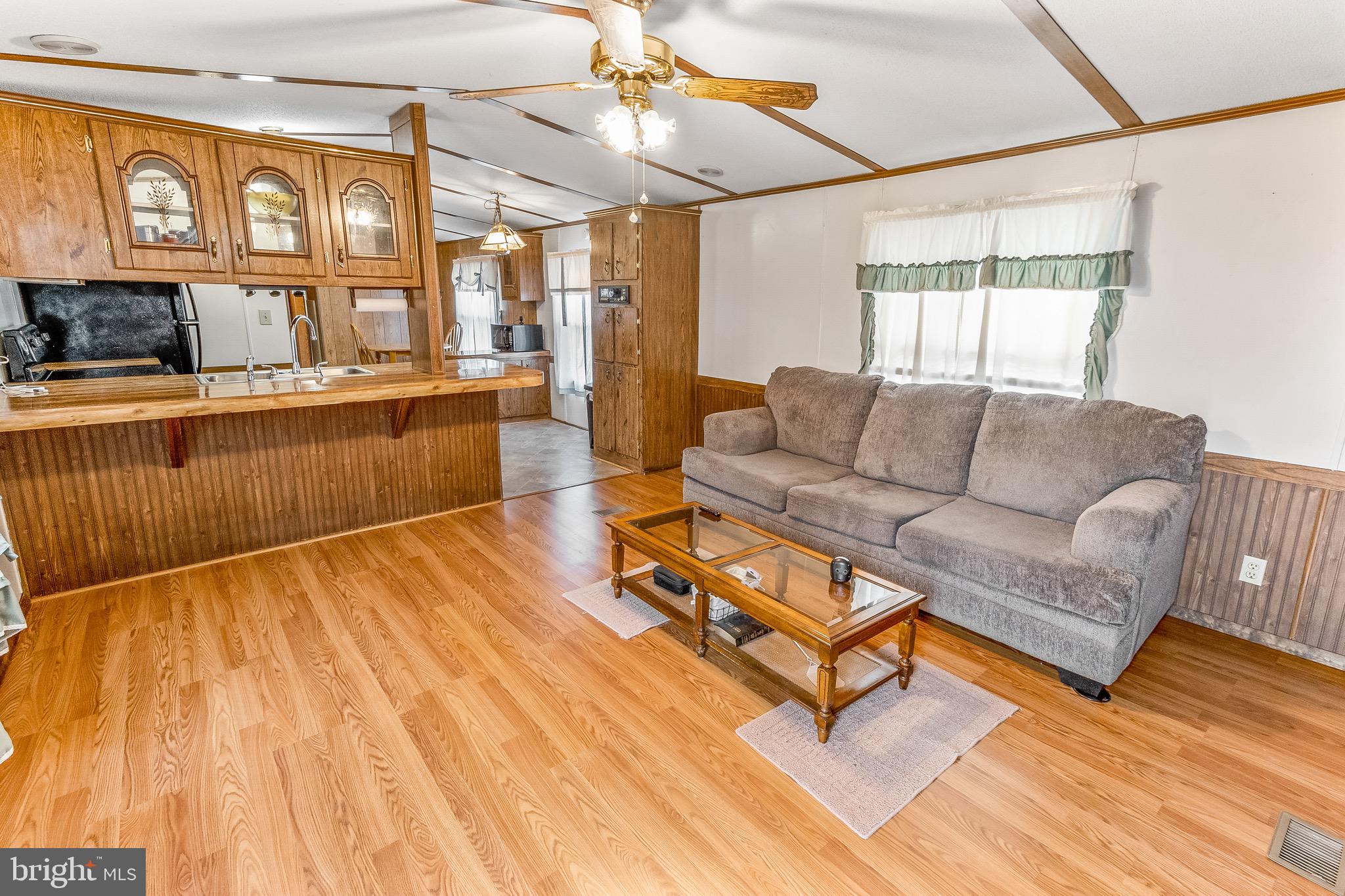 87 Explorer Lane Martinsburg, WV 25404 - Photo 6 of 27 a living room with furniture and a large window