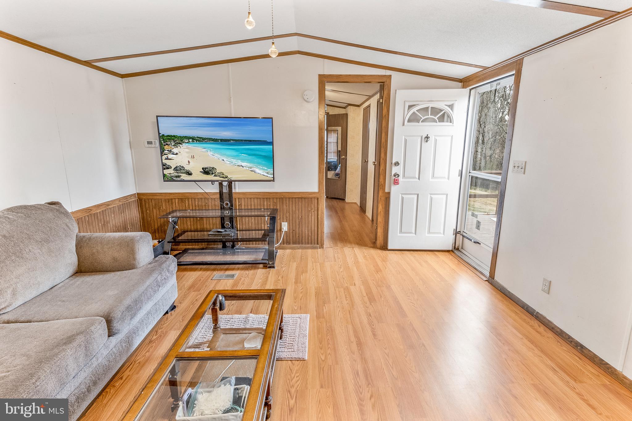 87 Explorer Lane Martinsburg, WV 25404 - Photo 8 of 27 a living room with furniture and a wooden floor