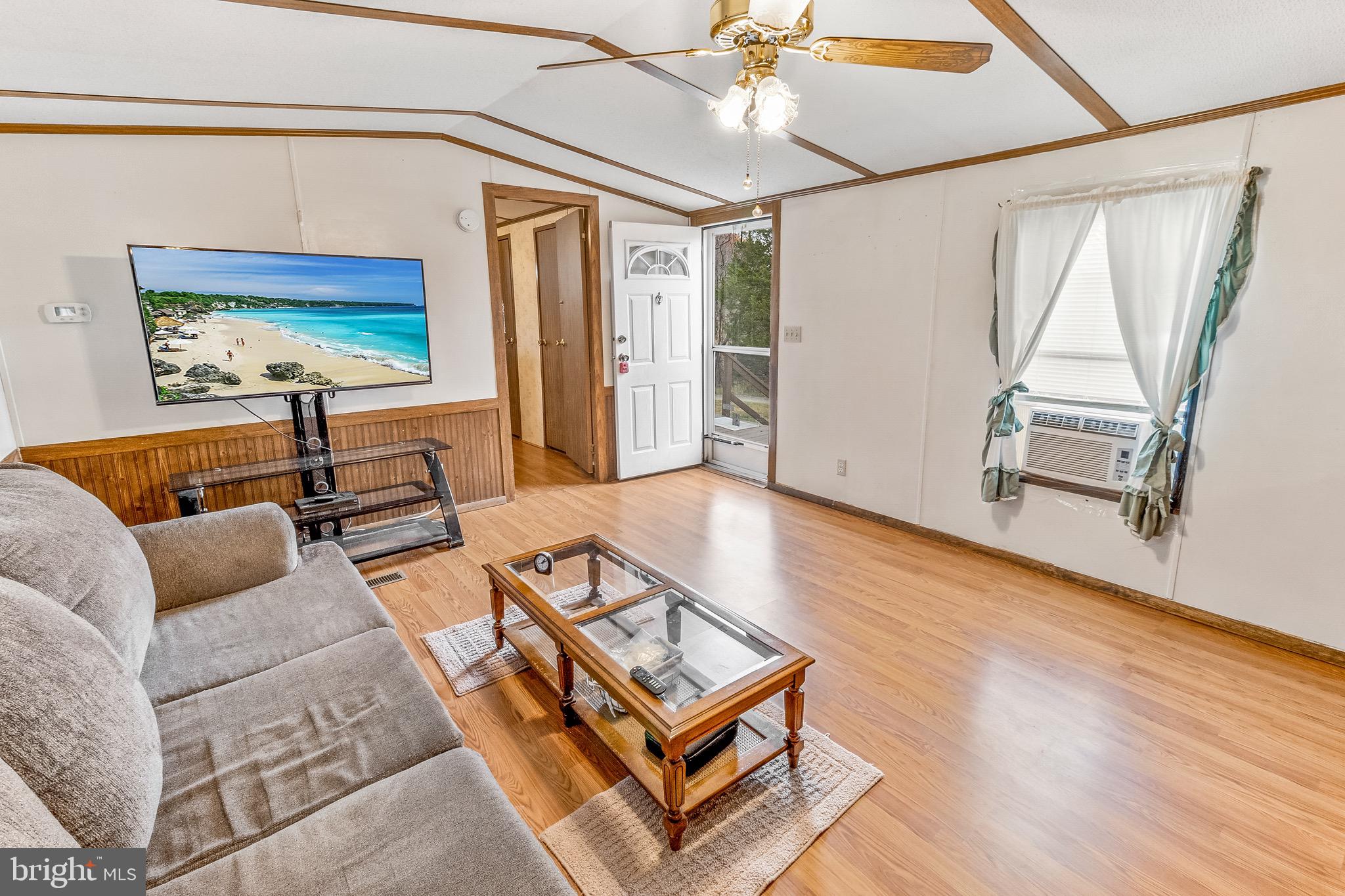 87 Explorer Lane Martinsburg, WV 25404 - Photo 9 of 27 a living room with furniture and a wooden floor