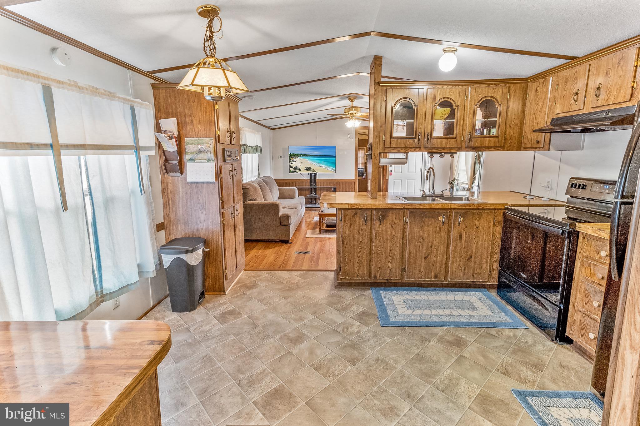 87 Explorer Lane Martinsburg, WV 25404 - Photo 10 of 27 a kitchen with stainless steel appliances granite countertop a refrigerator a stove and a sink with cabinets