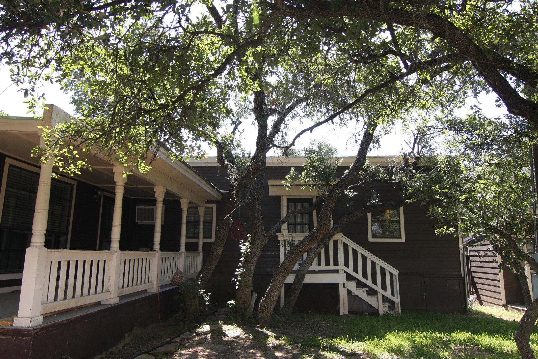7806-7804 Indian Ridge Drive Austin, TX 78737 - Photo 18 of 40 a view of a house with a deck