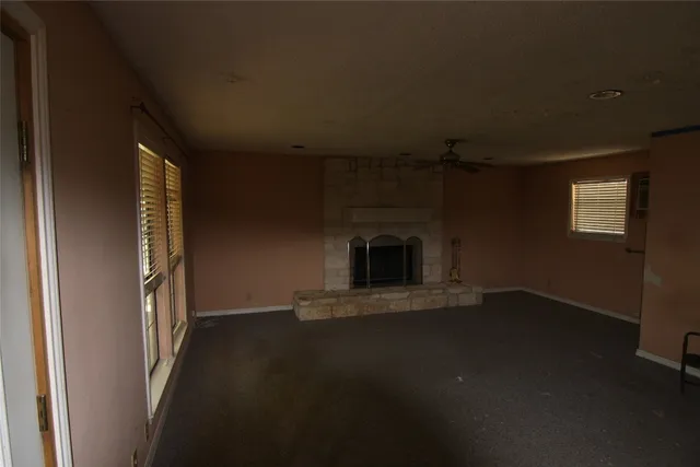 a room with furniture and a window