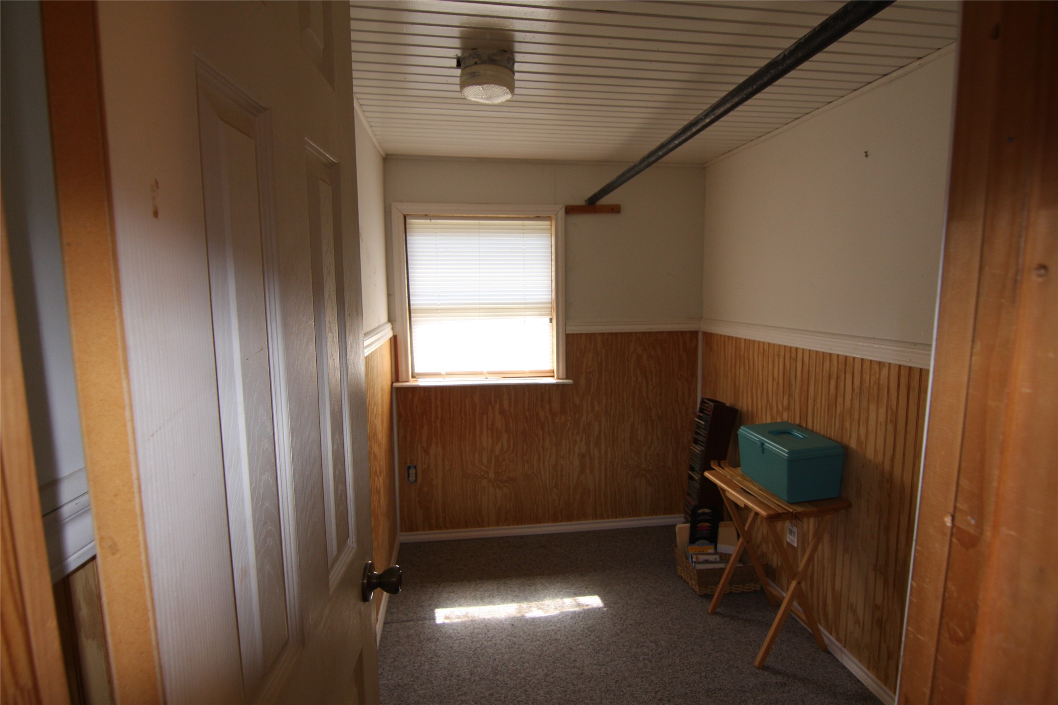 7806-7804 Indian Ridge Drive Austin, TX 78737 - Photo 34 of 40 a room with furniture and a window