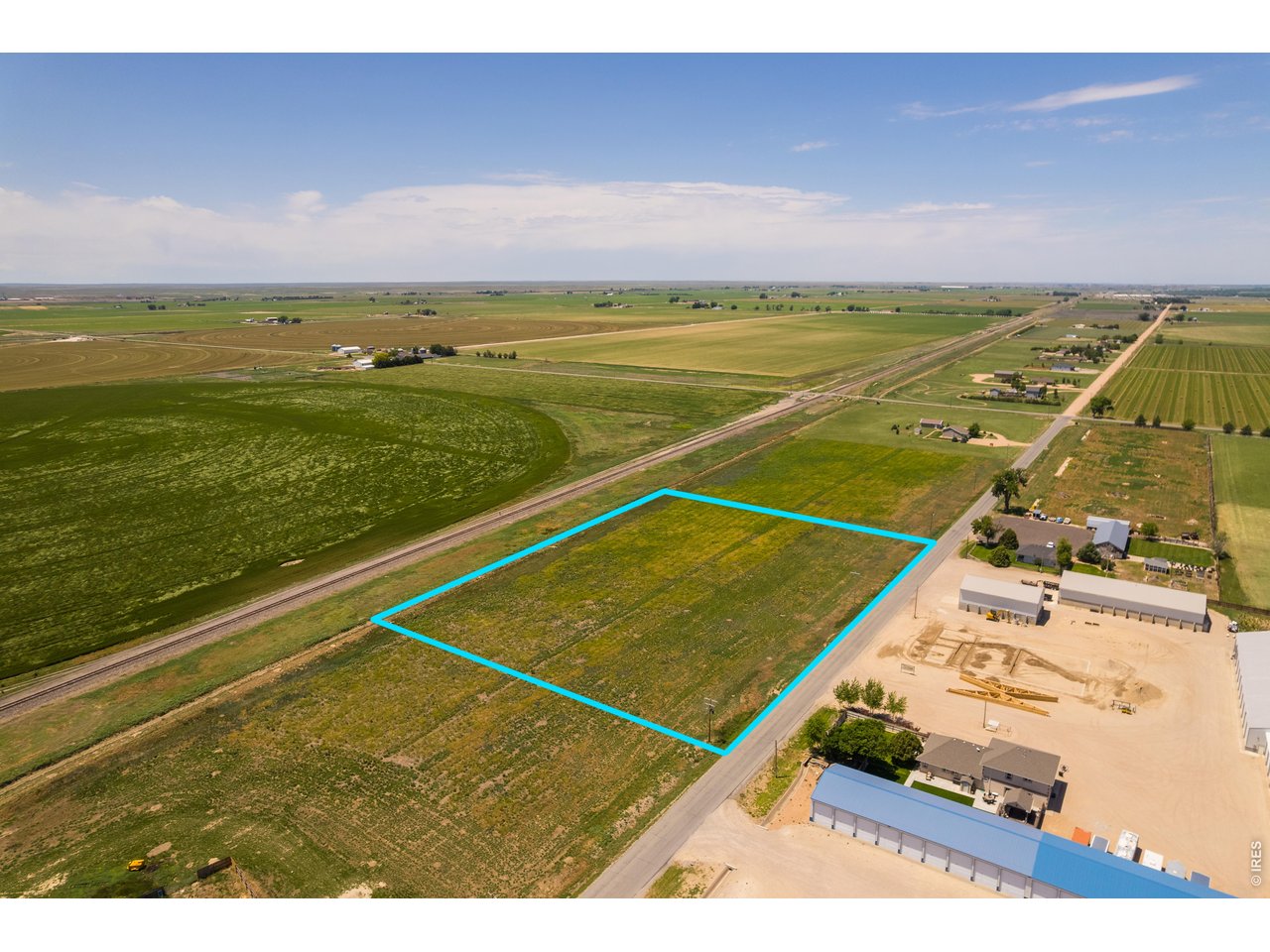 16302 County Road R Fort Morgan, CO 80701 - Photo 10 of 14 a view of an outdoor space and swimming pool