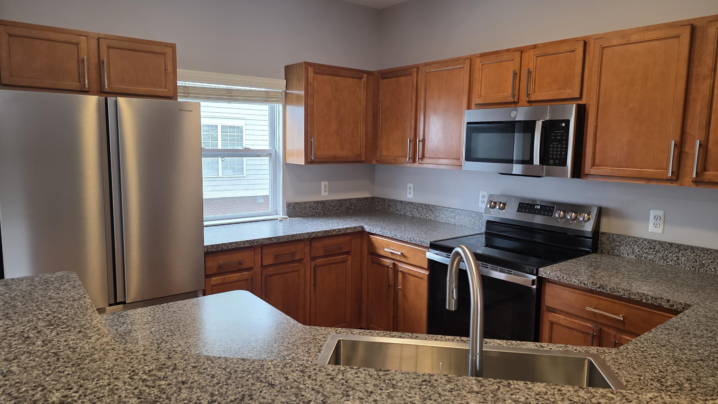 1563 Cass Lake Road Keego Harbor, MI 48320 - Photo 5 of 23 plenty of cabinetry