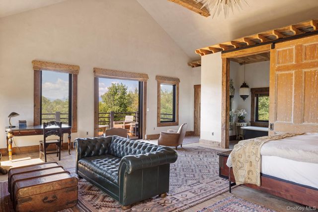 a outdoor living space with furniture and a potted plant