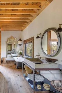 a bathroom with a glass door shower