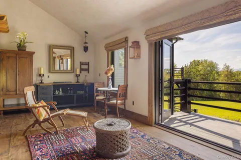 a living room with a couch and a flat screen tv