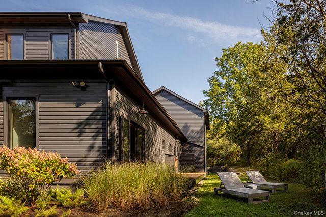 a front view of a house with street