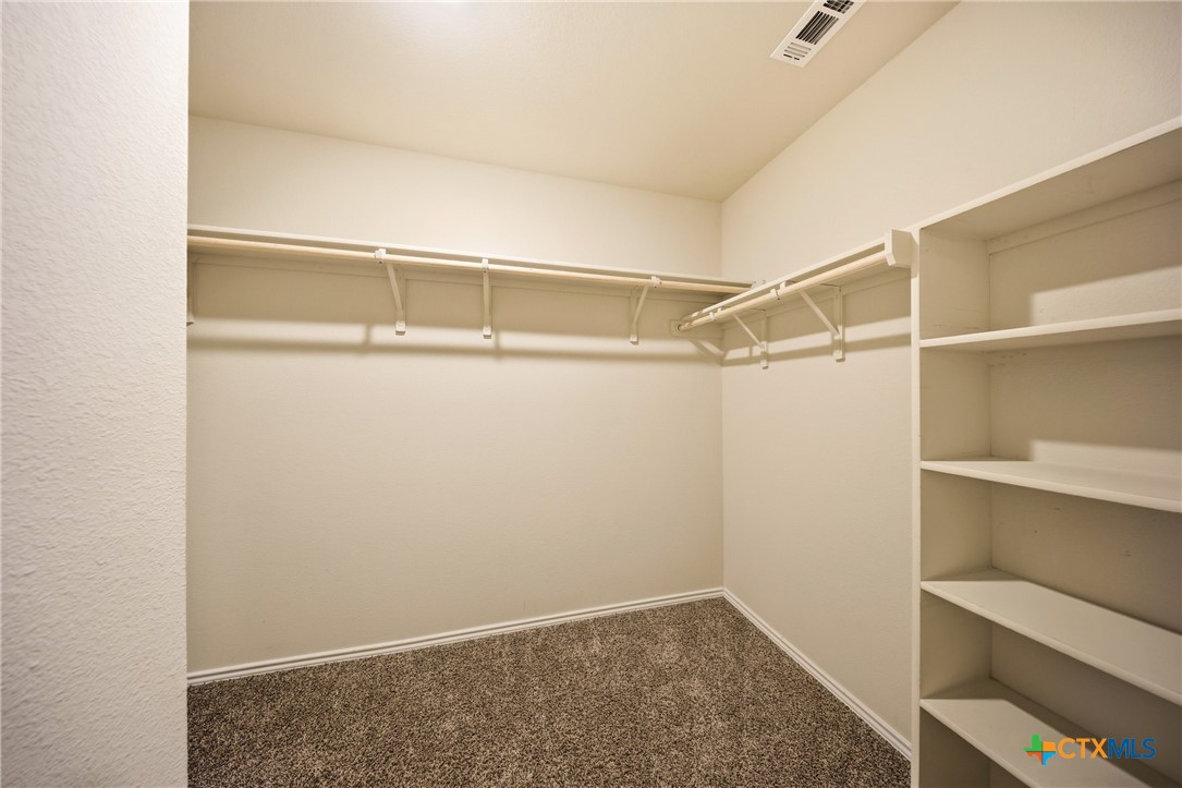 9506 Falme Lane Killeen, TX 76542 - Photo 14 of 27 a view of an empty walk in closet