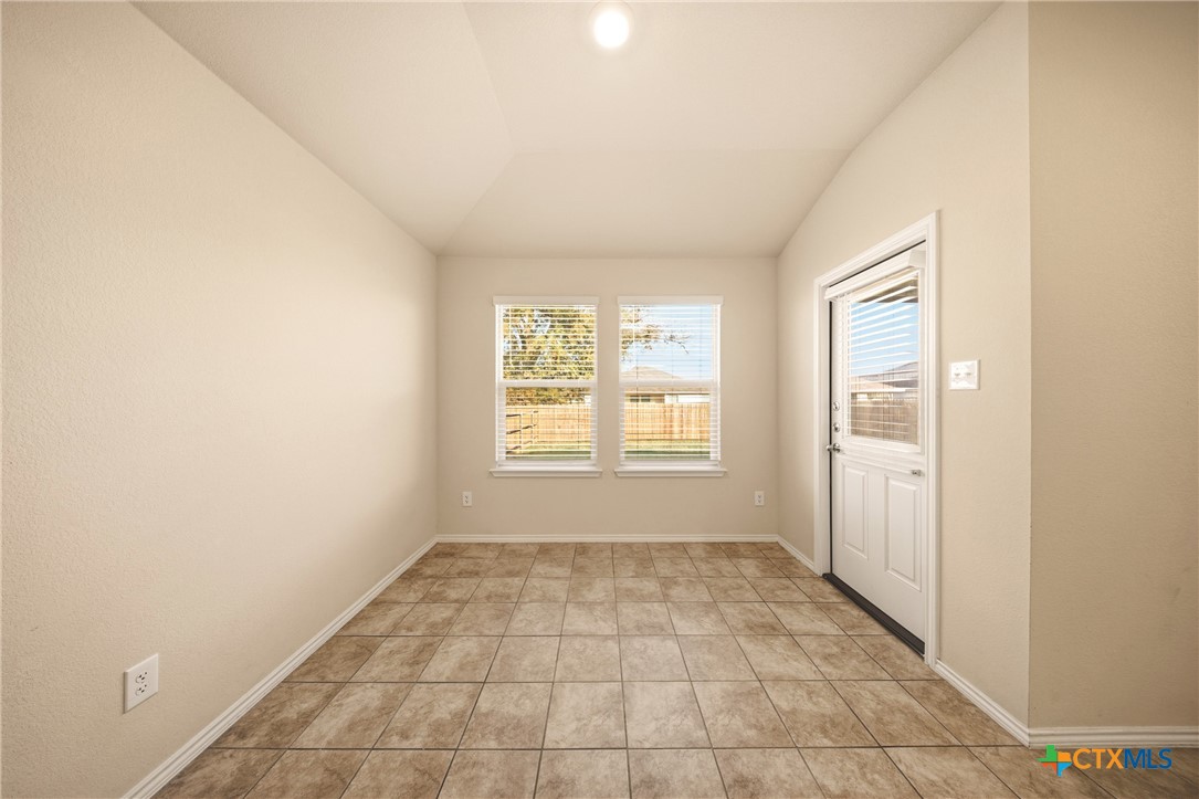 9506 Falme Lane Killeen, TX 76542 - Photo 6 of 27 a view of an empty room with a window