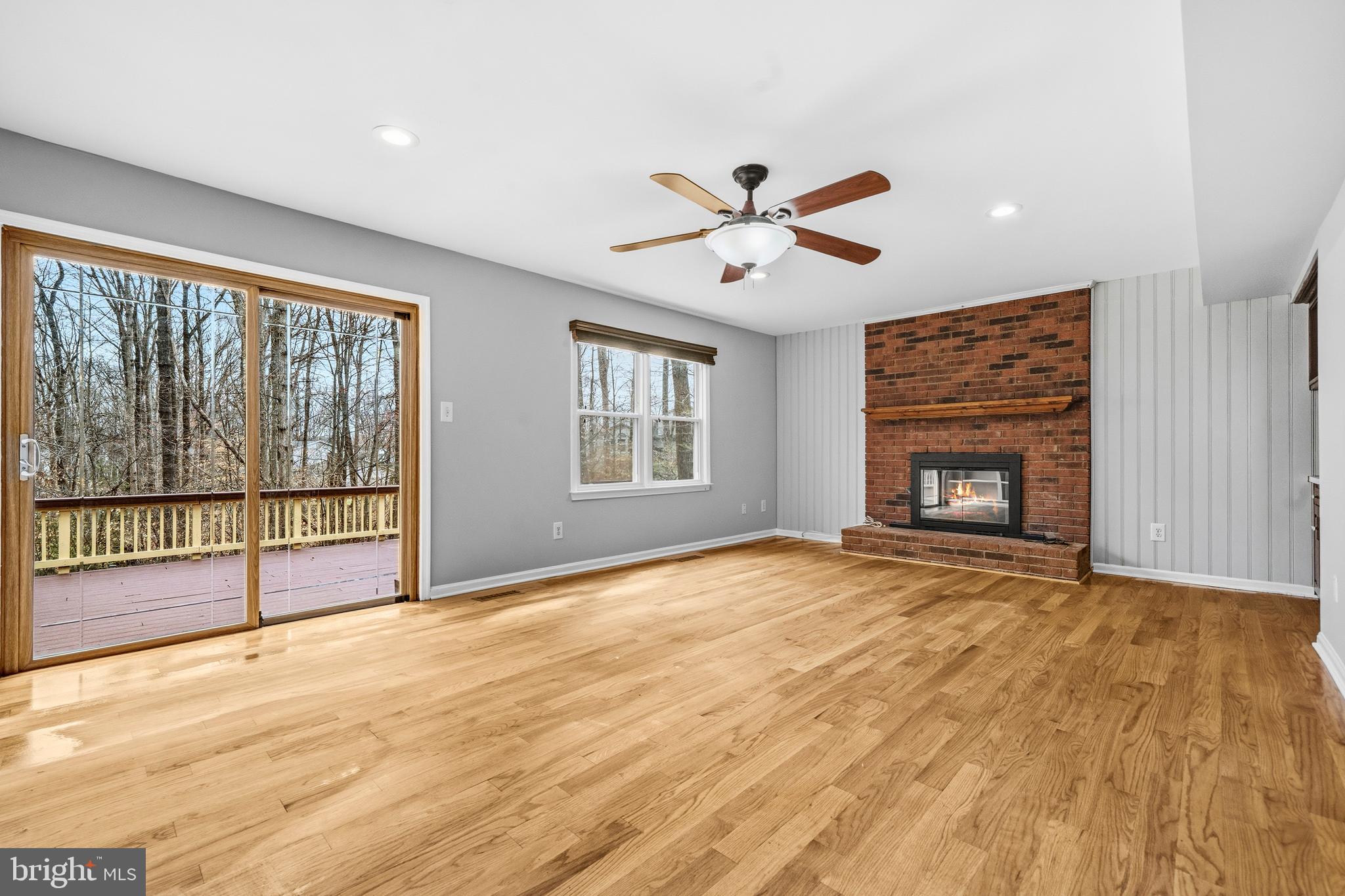 7201 Neaptide Lane Burke, VA 22015 - Photo 22 of 75 a view of empty room with wooden floor and fan