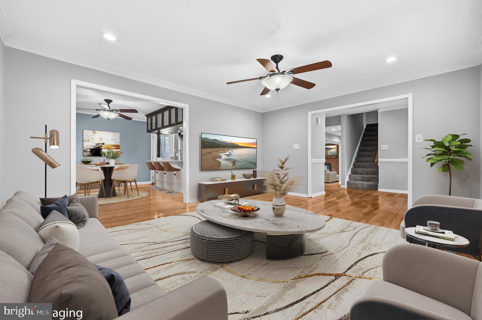7201 Neaptide Lane Burke, VA 22015 - Photo 4 of 75 a living room with furniture and a wooden floor