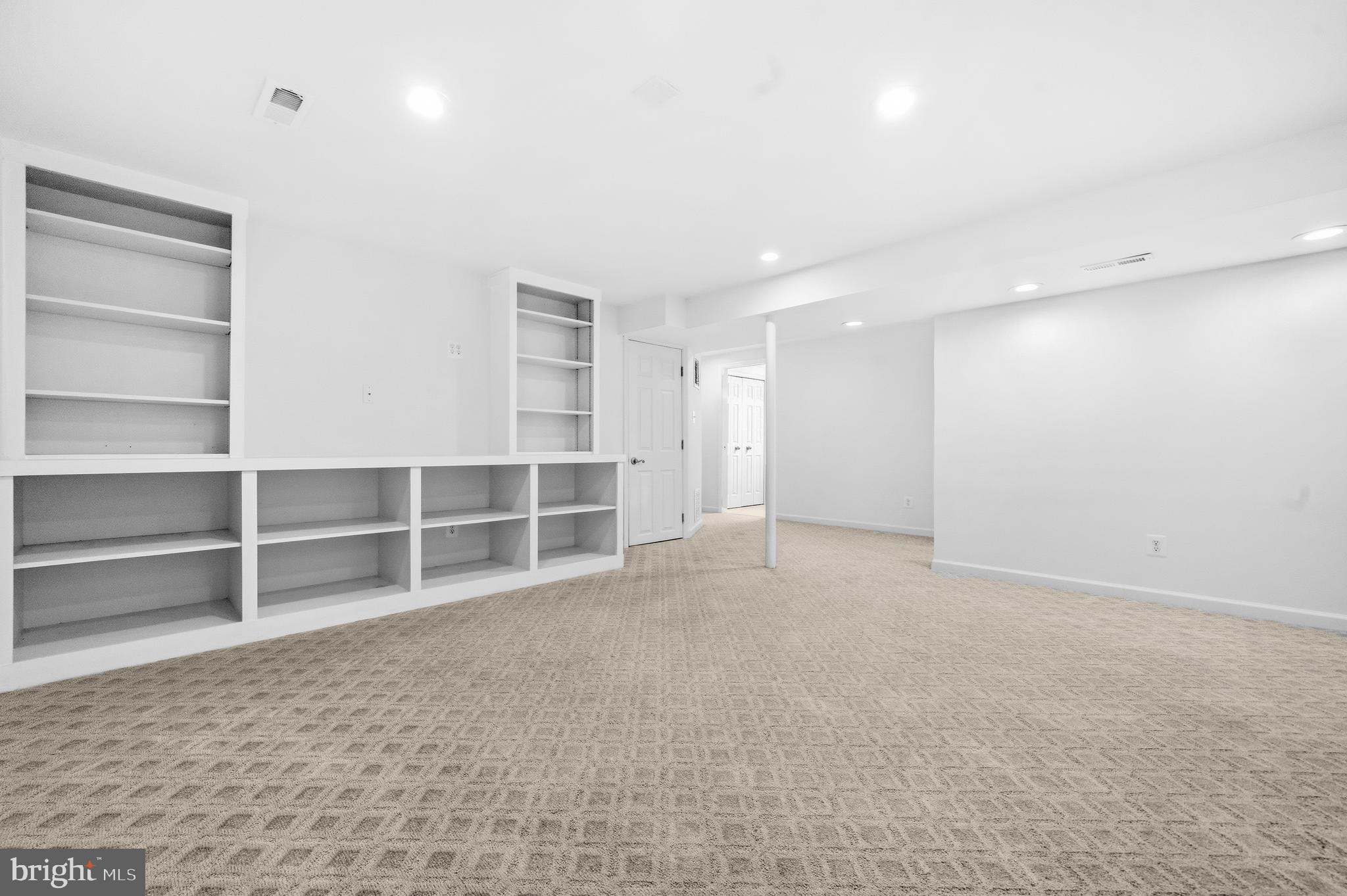 7201 Neaptide Lane Burke, VA 22015 - Photo 44 of 75 a view of an empty room with a closet and a window