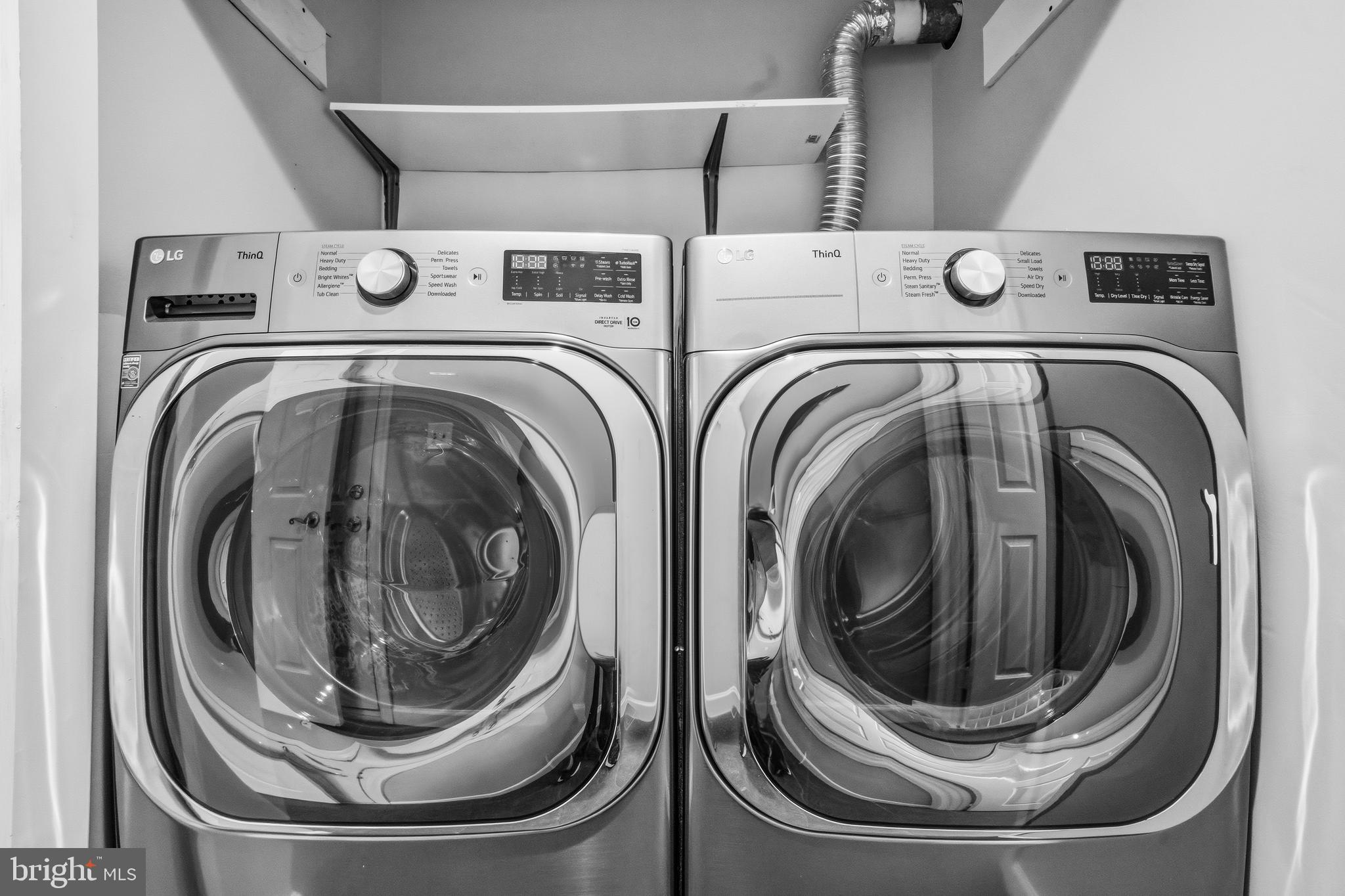 7201 Neaptide Lane Burke, VA 22015 - Photo 48 of 75 a utility room with dryer and washer