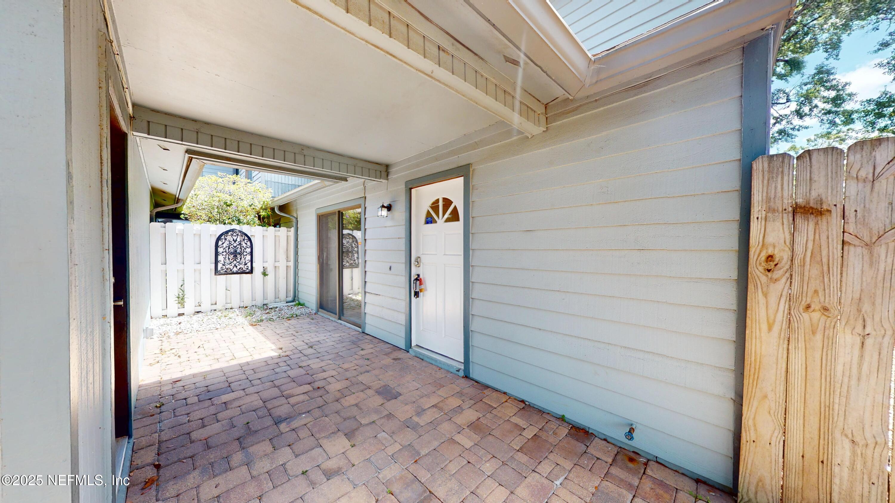 4402 Peppermill Place Jacksonville, FL 32257 - Photo 2 of 26 a view of a porch door