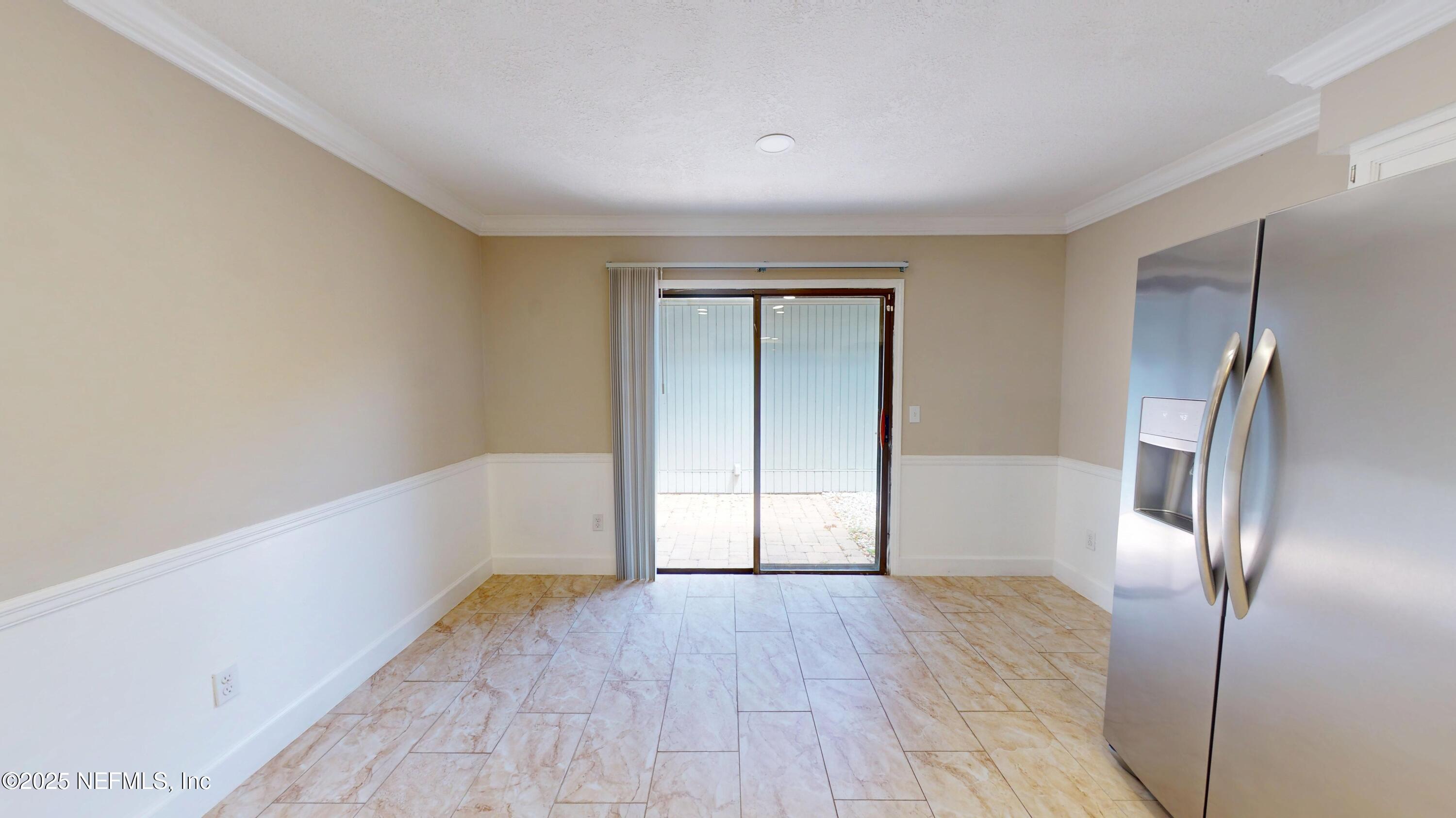 4402 Peppermill Place Jacksonville, FL 32257 - Photo 8 of 26 a view of empty room with wooden floor