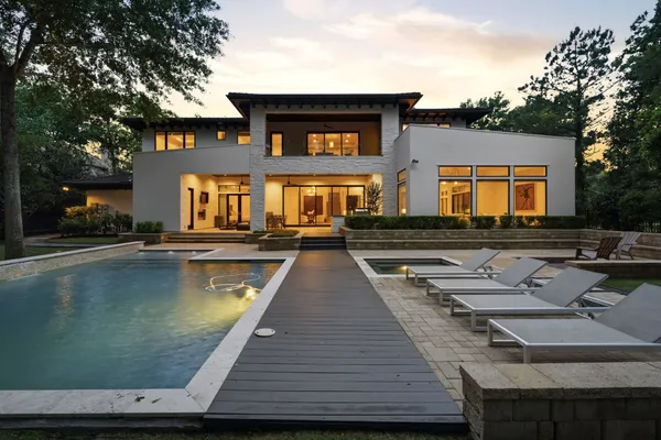 a view of a house with swimming pool