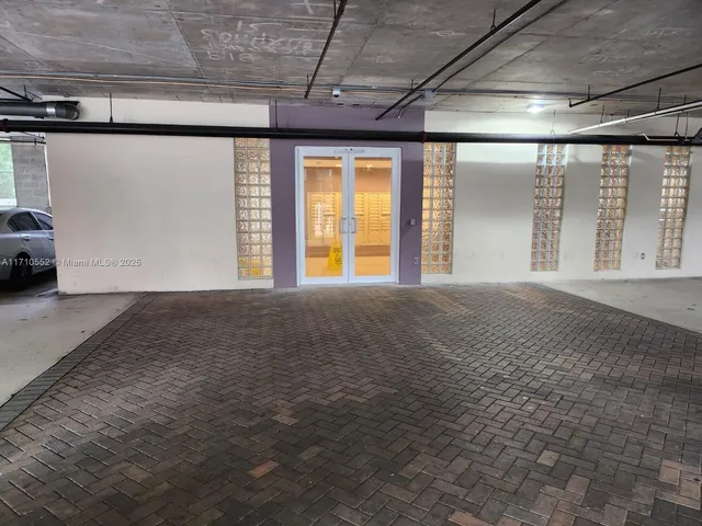 a kitchen with a sink a refrigerator and a stove