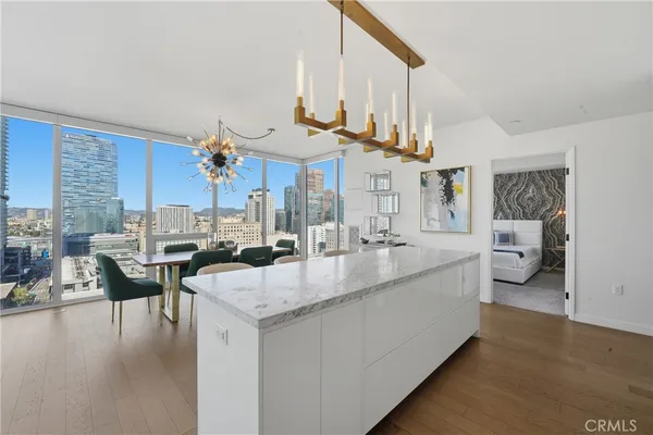 a kitchen with counter space and breakfast area