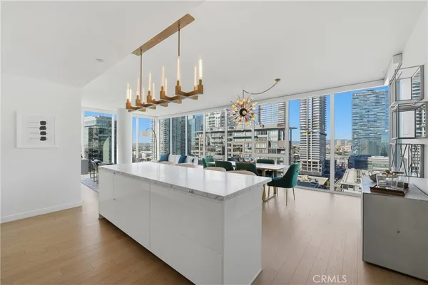 a very nice looking living room with a large window