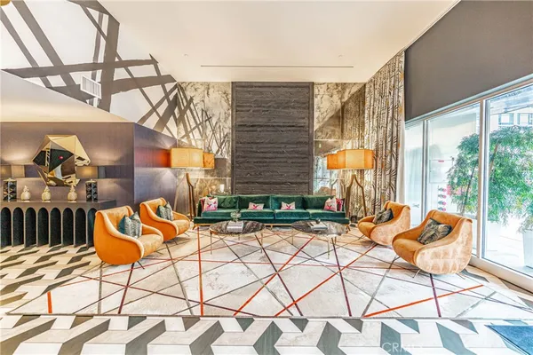 a living room with furniture and a table