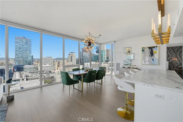 a view of a living room and dining room