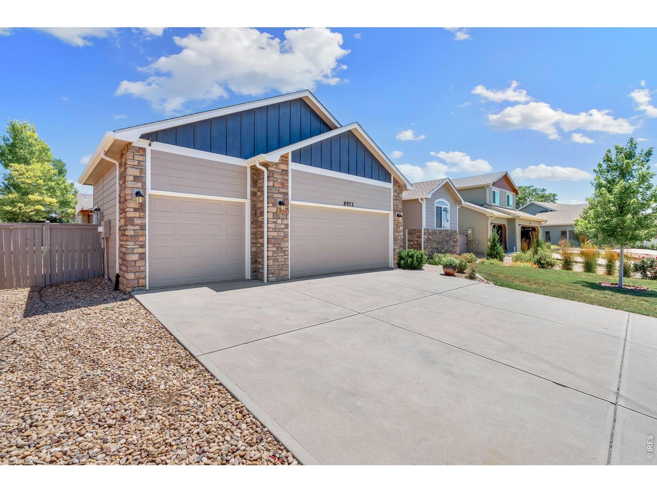 8972 Raging Bull Lane Wellington, CO 80549 - Photo 4 of 45 3 car attached garage