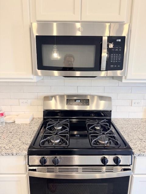 14205 Bacton Road Pilot Point, TX 76258 - Photo 11 of 19 a stove top oven sitting inside of a kitchen