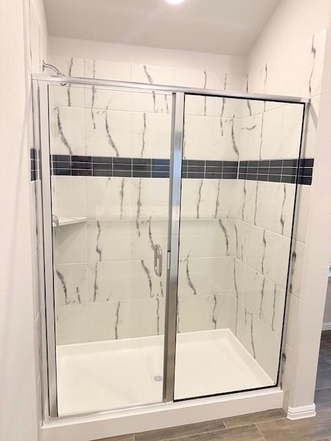 14205 Bacton Road Pilot Point, TX 76258 - Photo 15 of 19 a bathroom with a bathtub and a shower