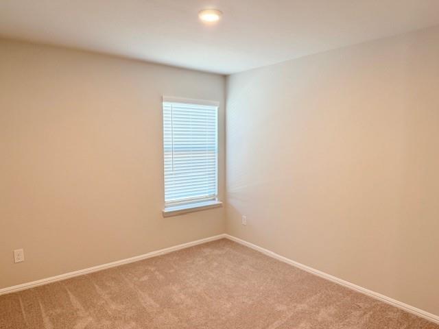 14205 Bacton Road Pilot Point, TX 76258 - Photo 4 of 19 an empty room with a window