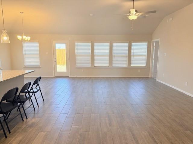 14205 Bacton Road Pilot Point, TX 76258 - Photo 8 of 19 an empty room with wooden floor and windows