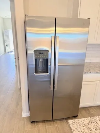 a view of a room from a corridor