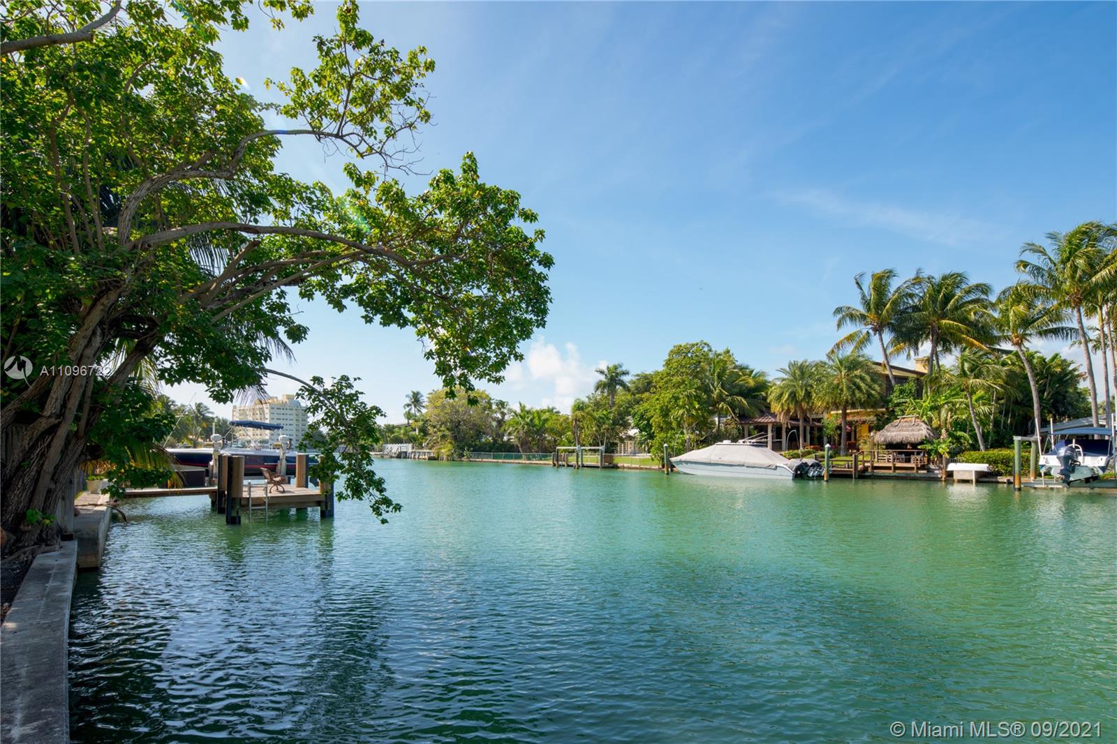 4900 Pine Tree Drive Miami Beach, FL 33140 - Photo 12 of 64 a view of a lake with outdoor space