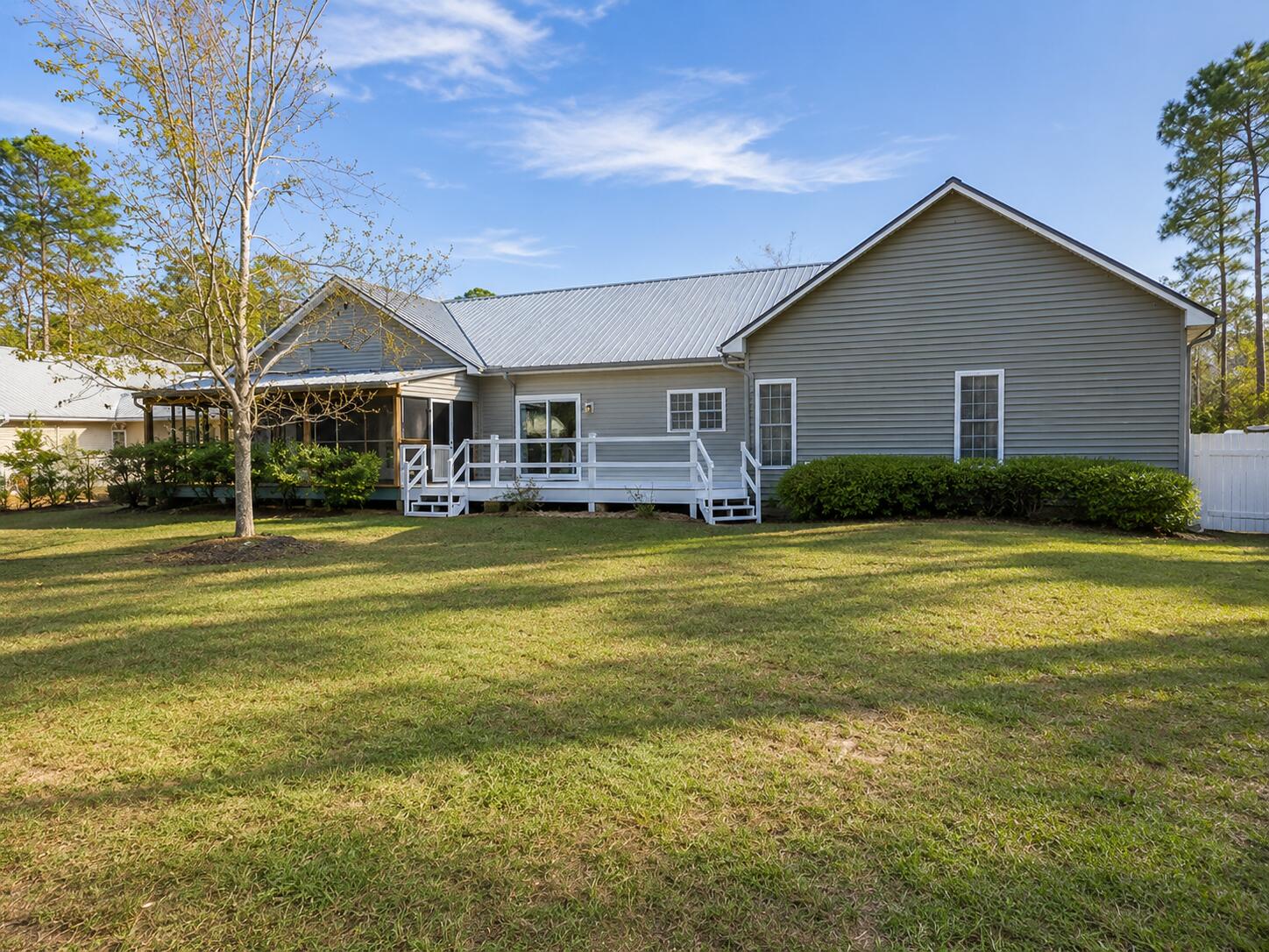 147 Dover Lane Freeport, FL 32439 - Photo 24 of 27 a view of a house with a yard