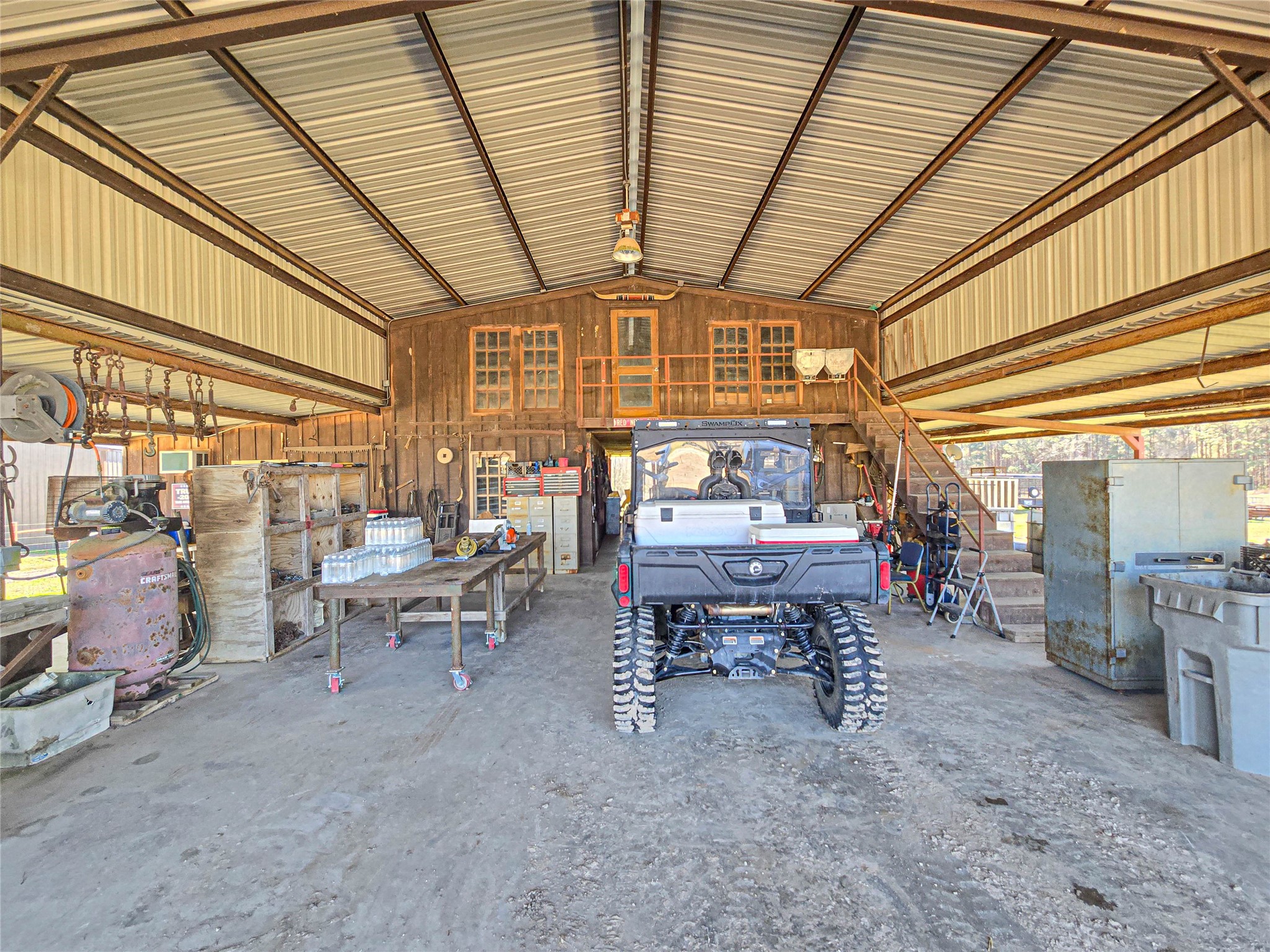 684 Hooks Road Corrigan, TX 75939 - Photo 21 of 34 a view of a room with gym equipment