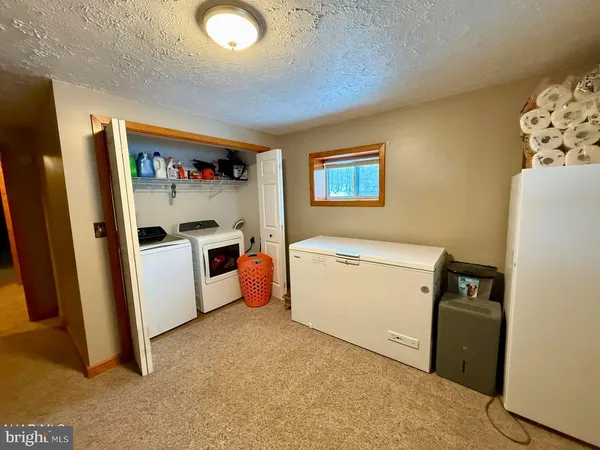 a view of utility room with washer and dryer