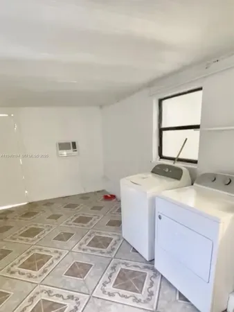 a room with a washer and dryer