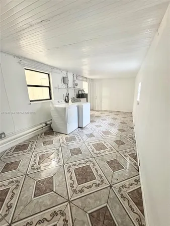 a view of a kitchen with a sink