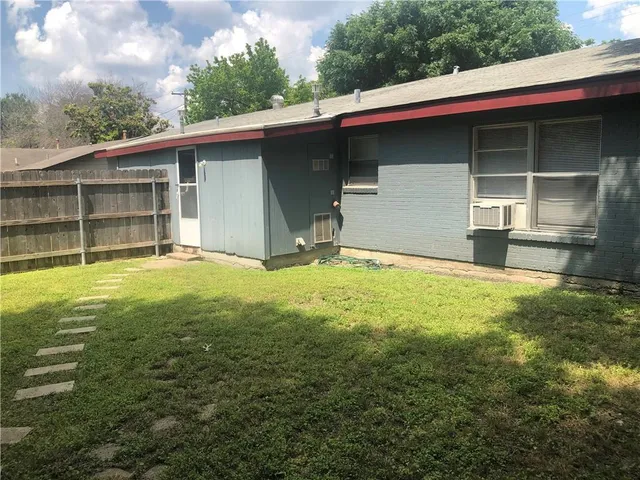 a house with yard in front of it