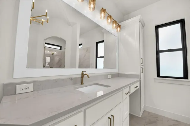 a view of cabinets and wooden floor