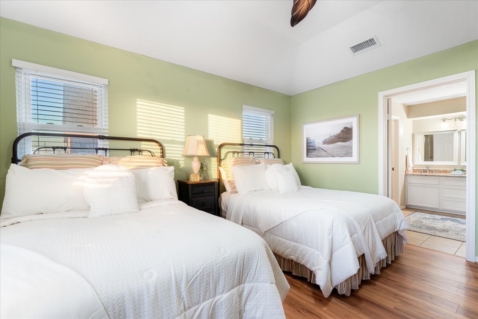 24043 Termini-San Luis Pass Road Galveston, TX 77554 - Photo 17 of 26 a bedroom with two beds and a window