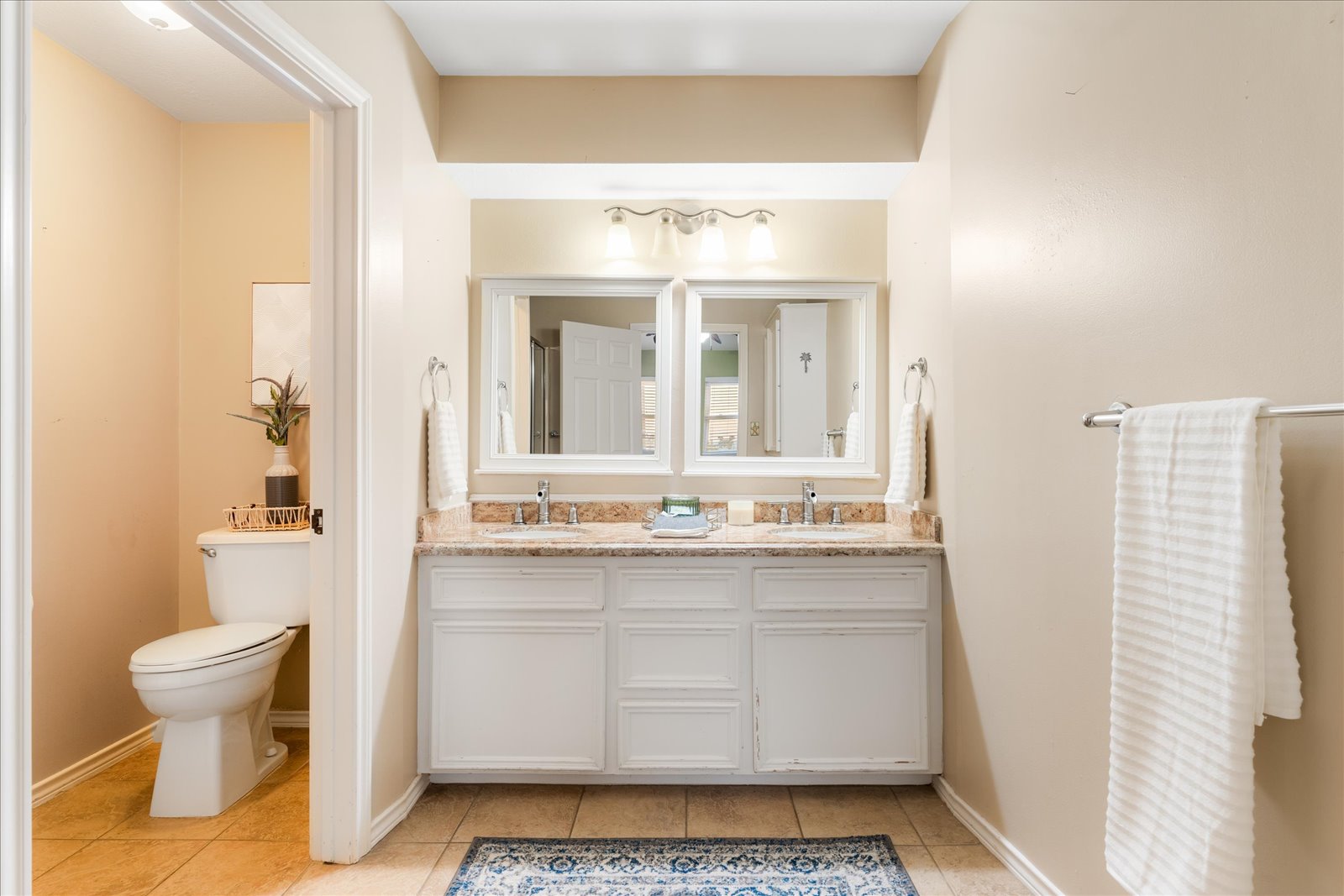 24043 Termini-San Luis Pass Road Galveston, TX 77554 - Photo 18 of 26 a bathroom with a sink and a toilet