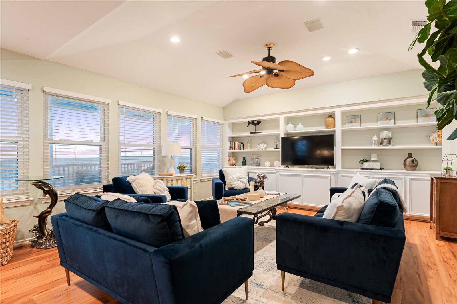 24043 Termini-San Luis Pass Road Galveston, TX 77554 - Photo 7 of 26 a living room with furniture kitchen view and a flat screen tv